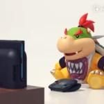 Bowser Jr. đang chơi game trên Nintendo Switch 2, hình ảnh minh họa cho những lo ngại về kiểm soát phụ huynh khi sử dụng camera.