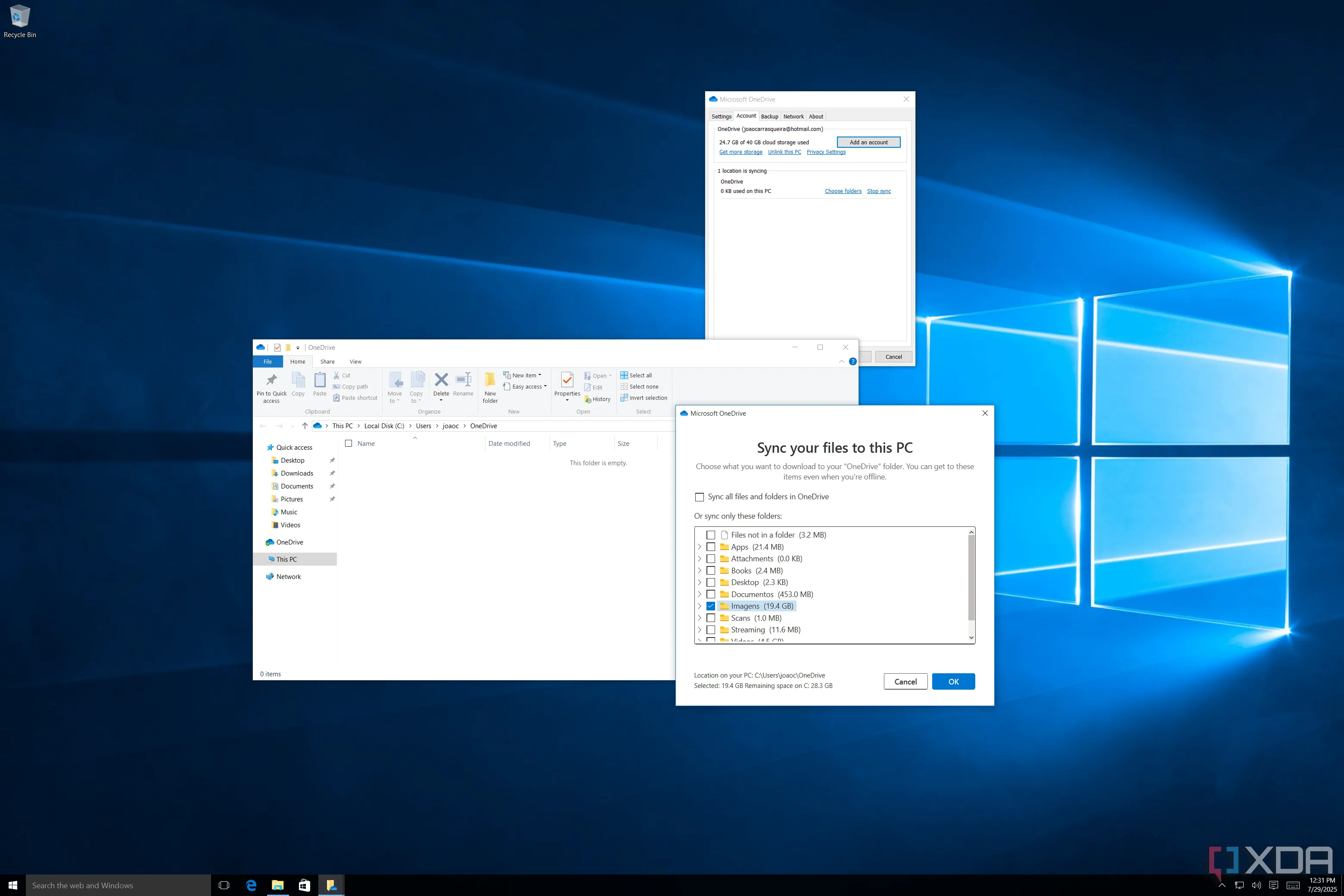 Cài đặt OneDrive trên Windows 10 phiên bản 1507, cho thấy tùy chọn đồng bộ yêu cầu tải về toàn bộ tệp.