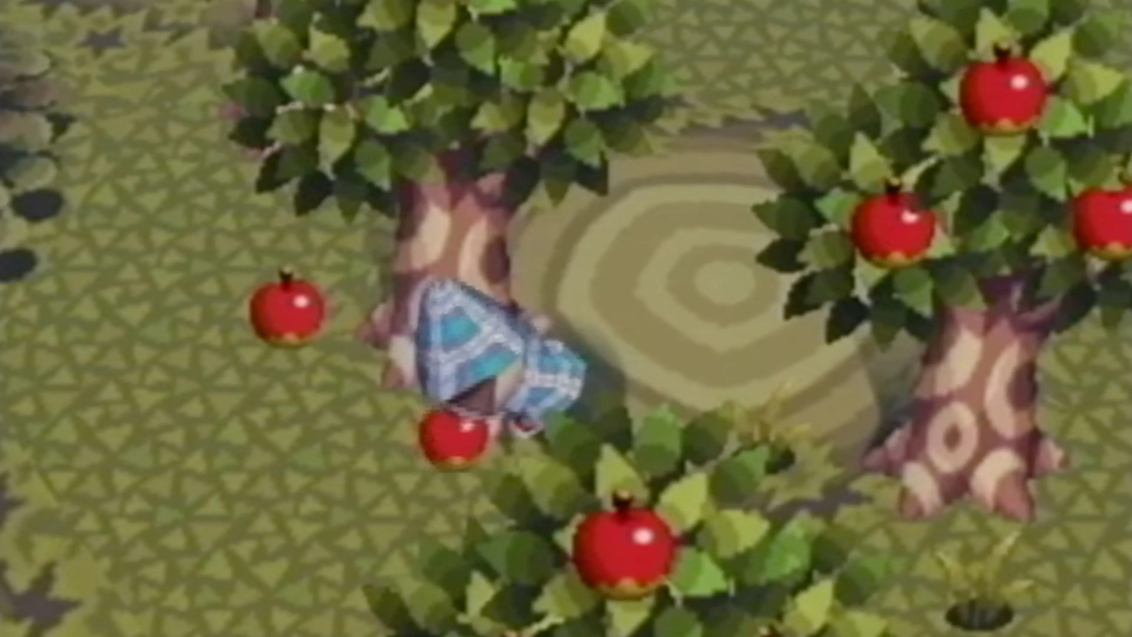 Cư dân đang thu hoạch táo trong Animal Crossing phiên bản GameCube