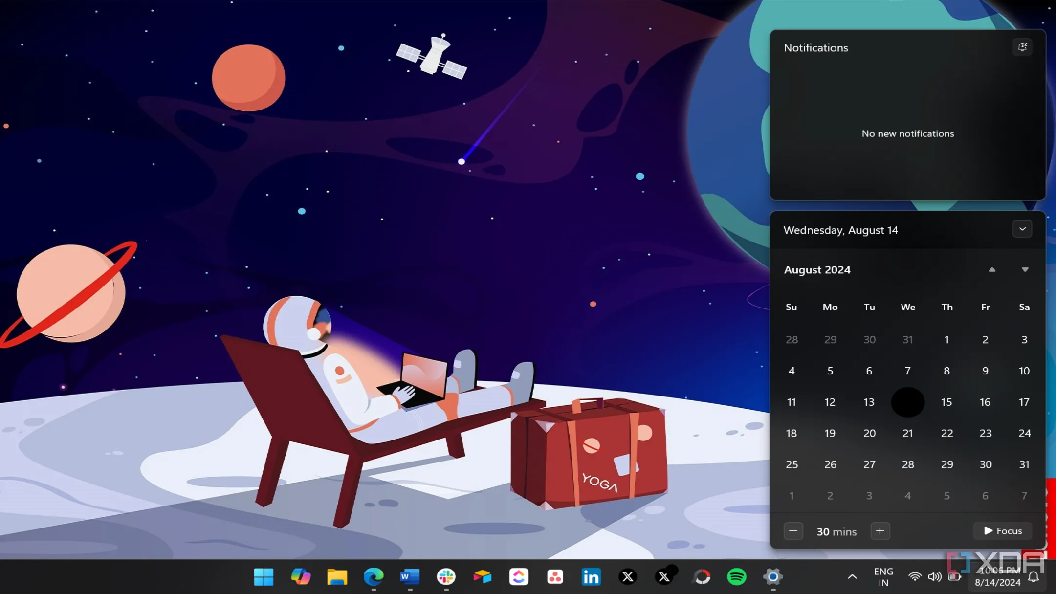 Đồng hồ và lịch tích hợp trong Calendar flyout của Windows 11 với giao diện tối