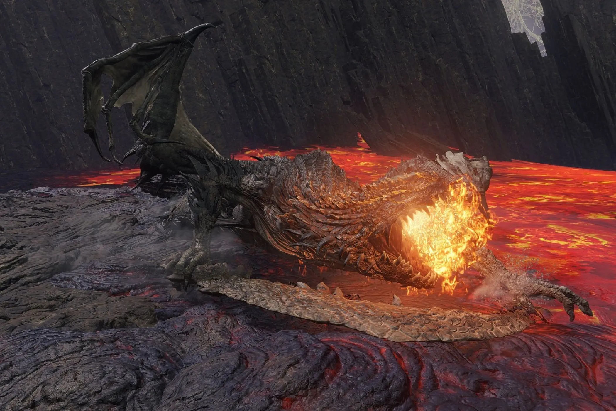 Magma Wyrm Elden Ring bò giữa dòng dung nham rực lửa trong trận chiến đầy thử thách