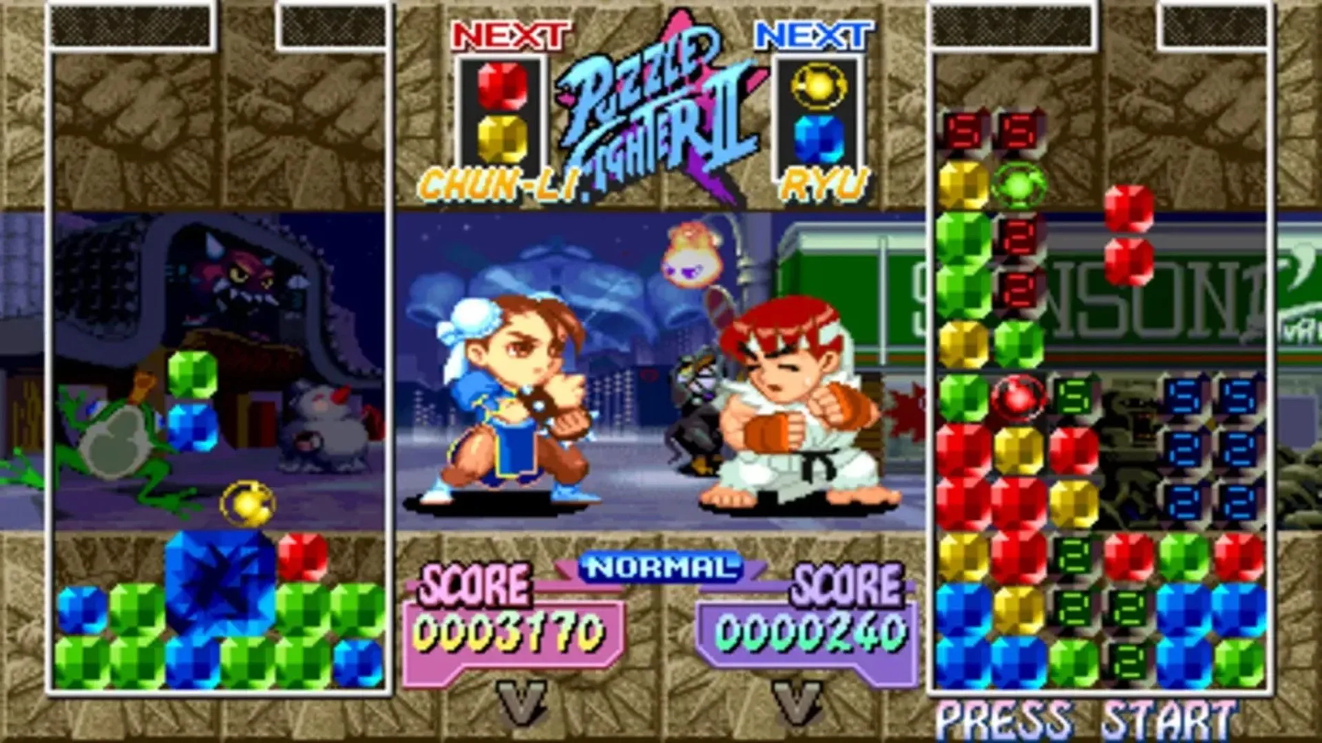 Màn hình gameplay Super Puzzle Fighter II Turbo với Chun-Li và Ryu, thể hiện lối chơi giải đố kết hợp đối kháng.