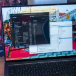 Màn hình laptop Windows 11 hiển thị Task Manager và Task Scheduler, liên quan đến các tác vụ hệ thống sau khi lỗi Easy Anti-Cheat được khắc phục