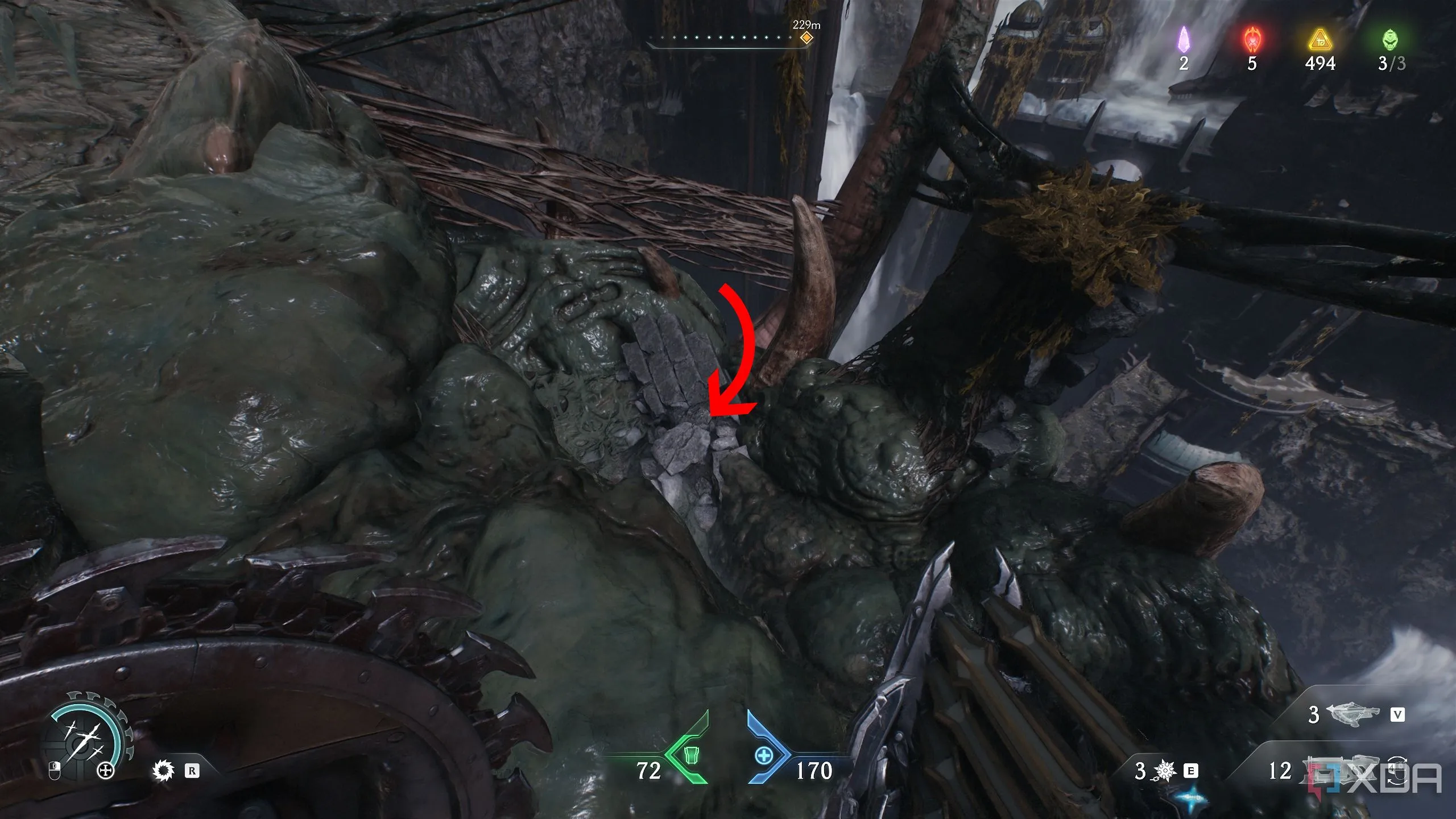 Mũi tên chỉ đến nền tảng thấp hơn có vàng trong Chương 14 Doom The Dark Ages.