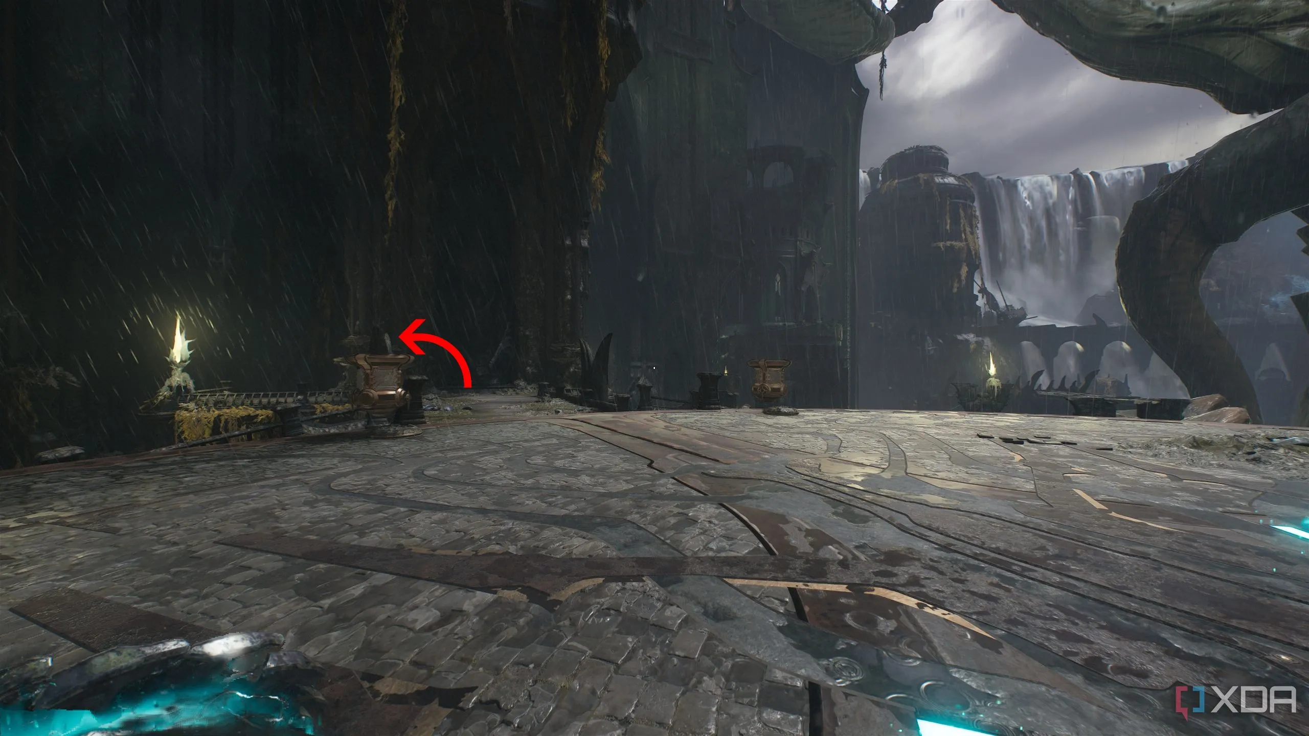 Mũi tên chỉ lối rẽ trái về phía cột sáng vàng trong Chương 14 Doom The Dark Ages.